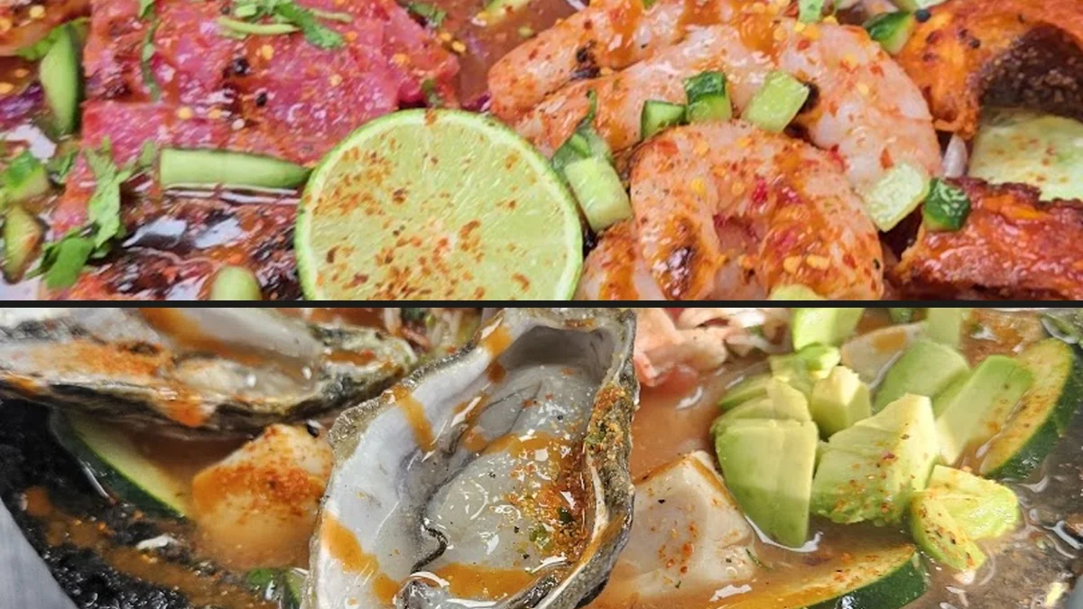 Unpretentious restaurant tables with plated seafood.